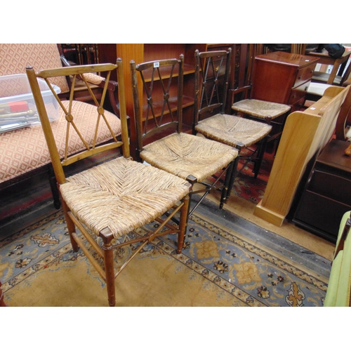 298 - Set of three rush seated chairs, and one other chair (4).