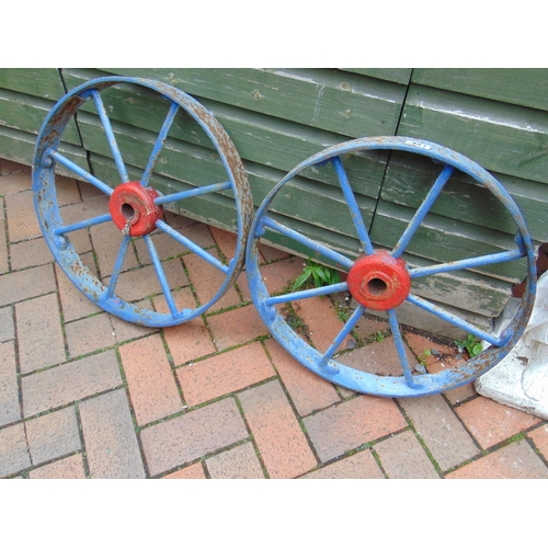 481 - Pair of antique cast iron cart wheels, each 19