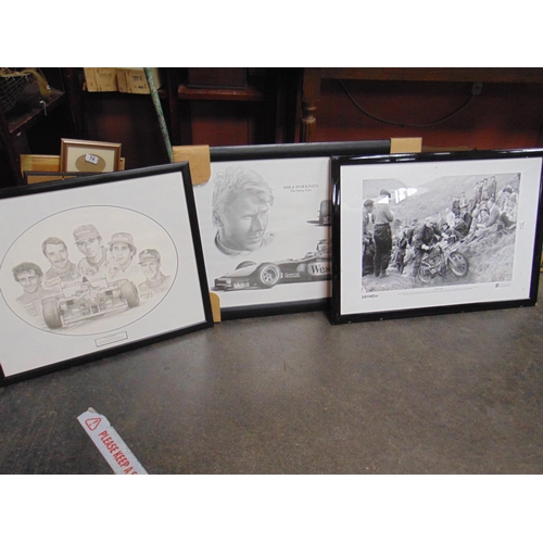 56 - Three framed and glazed motor racing prints.