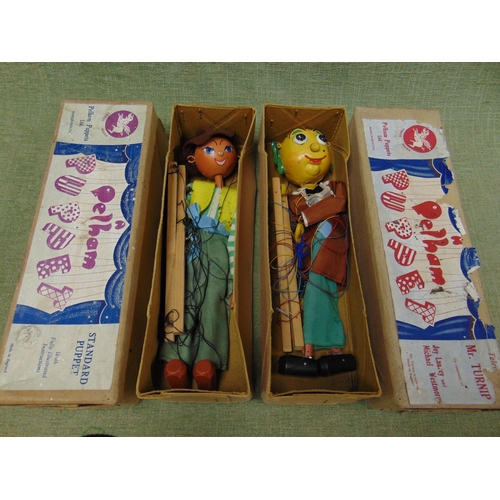 76 - Two Pelham Standard Puppets, Type SS Cowgirl, and Type SL Mr. Turnip, in original boxes.