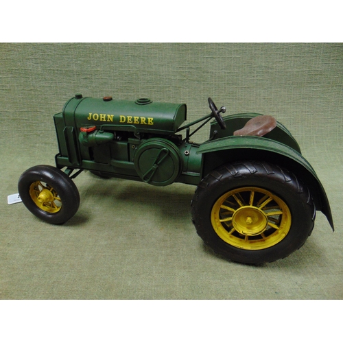 87 - Painted metal scale model John Deere tractor.