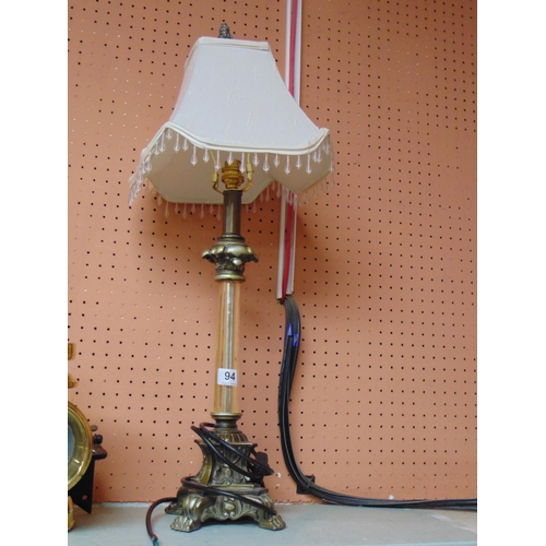 94 - Ornate table lamp with shade.