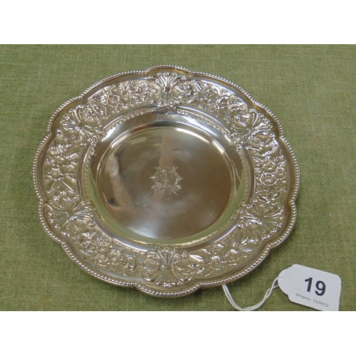 19 - Victorian circular silver dish with bead rim and ornately embossed border, engraved with monogram to... 