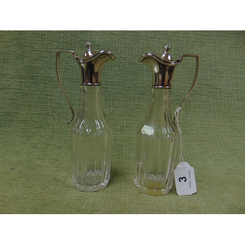 3 - Pair of Victorian facetted glass oil bottles with hinged silver tops and handles, London 1861, 7.5