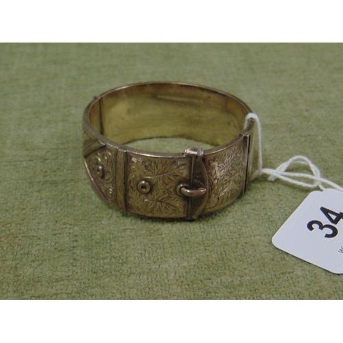 34 - George V silver 'buckle' bangle, Birmingham 1920.