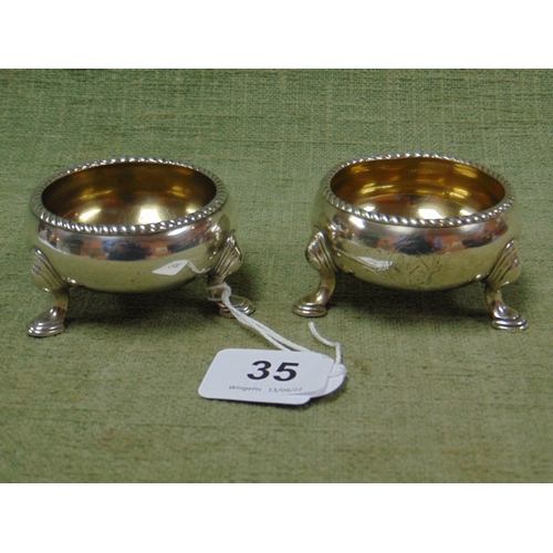 35 - Pair of Georgian circular open salts with gilded interiors and on hoof feet, hallmarks rubbed, 3