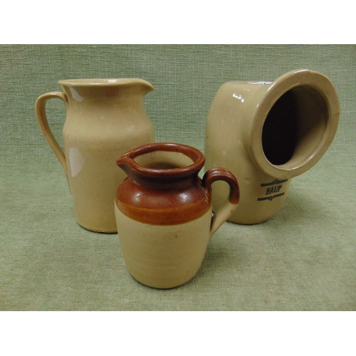 52 - Stoneware salt container and two stoneware jugs.