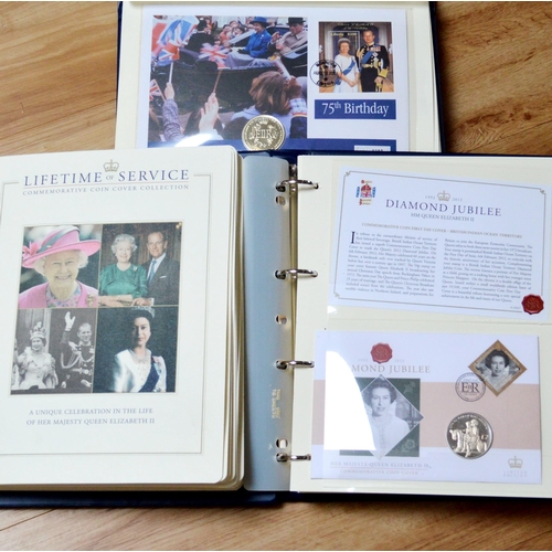 59 - Three albums of First Day Covers and commemorative coins, over 50 in total.