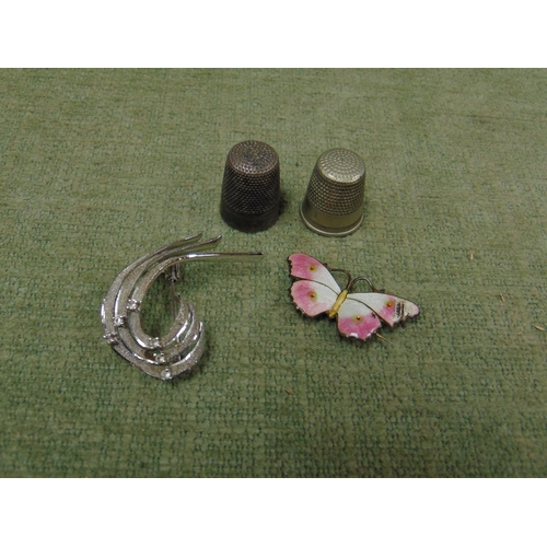 6 - Art deco silver brooch, silver gilt butterfly brooch and two plated thimbles.