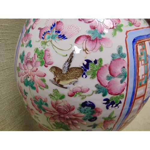 1 - Large oriental vase, having moulded figural sides, traditional familie rose decoration. 25