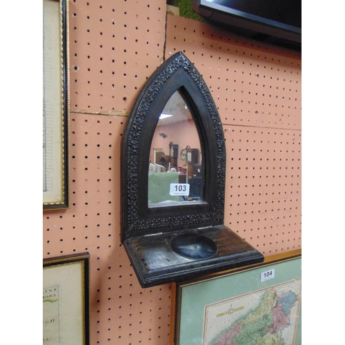 103 - Arched top wall mirror, having pull up shelf. 14 x 8