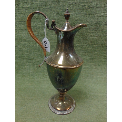 110 - Good quality plated lidded ewer, urn form finial, wicker bound handle and on footed base. 12