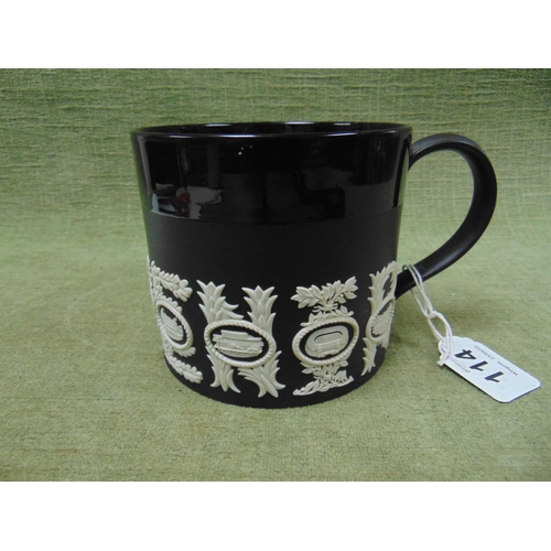 114 - Black Wedgwood 'Sporting' mug, limited edition No. 338/500.