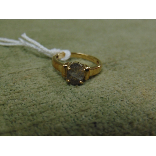 15 - 9ct gold ring with blue tone stone. Size N.