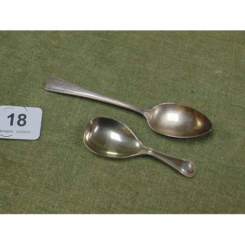 18 - Antique silver spoon, Exeter 1880, together with a silver caddy spoon. (2).