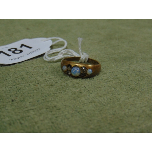 181 - Marked 18ct gold cased ring, set with opal coloured stones, one absent.