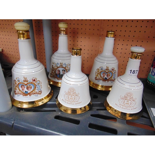 187 - Three full Wade Bells whisky decanters and two empty examples. (5).