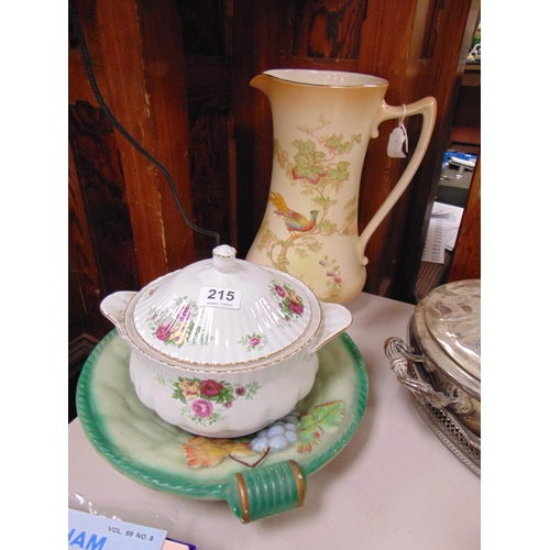 215 - Crown Ducal jug, floral lidded tureen and a chalk dish, (3).