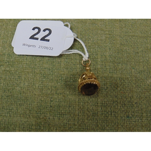 22 - 9ct gold watch chain fob with shield form decoration and smoky quartz stone. 5.66 g inc.