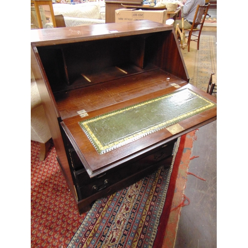 310 - Reproduction mahogany bureau, fall front, four long drawers with swan neck handles and on bracket fe... 