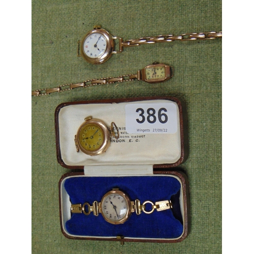 386 - Four 9ct gold cased watches.