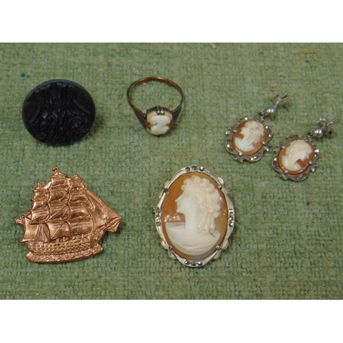 388 - Silver framed Cameo, matching pair of earrings , similar ring, seal and a sailing vessel brooch.