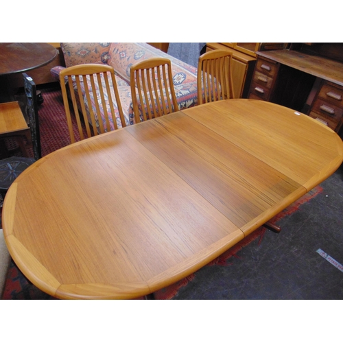 413 - Lauritis.M.Larsen , teak framed extending oval form dining table, having two extra leaves.85