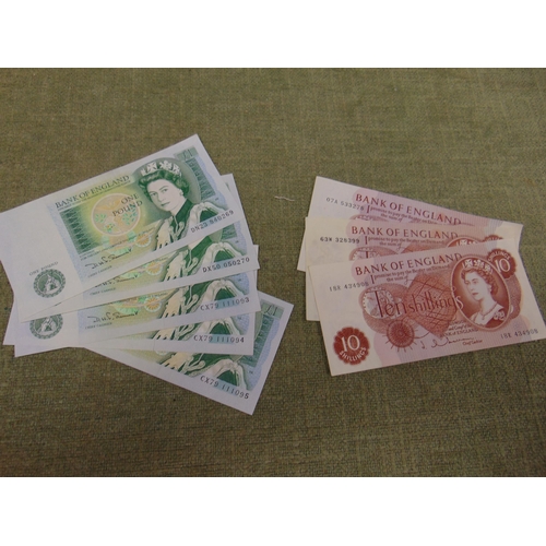 421 - Five one pound notes , 3 having consecutive numbers , together with three Ten Shilling notes.