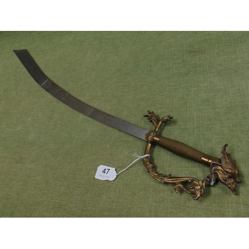 47 - Ornamental Eastern sword, having dragon head handle. 34