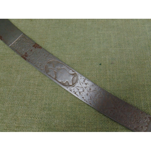 47 - Ornamental Eastern sword, having dragon head handle. 34