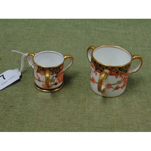 7 - Royal Crown Derby Tyg, and one smaller example. (2).