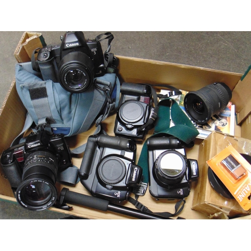 70 - Five canon cameras, lenses, etc.