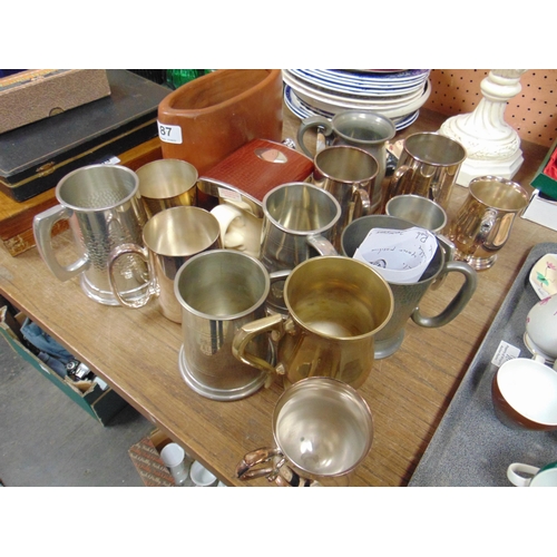 87 - Collection of tankards, shaving mug, Winston Churchill figure, hip flask, etc.