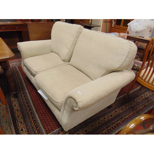 313 - Antique style two seater settee, on tapered frontal supports and castors. 72