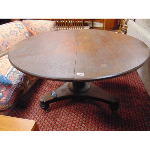 314 - Antique mahogany breakfast table, circular top, capstan column, trifoile base, bun feet and castors.... 