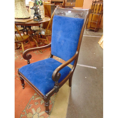 306 - Victorian arm chair, upholstered back and seat, on turned frontal supports.