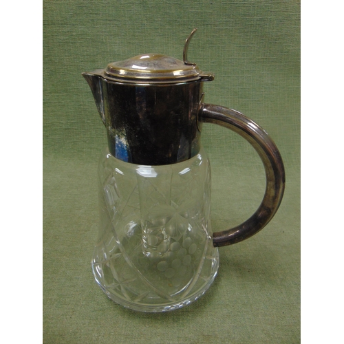 131 - Good antique water infuser, having plated mount and handle , and grape vine engraved decoration.