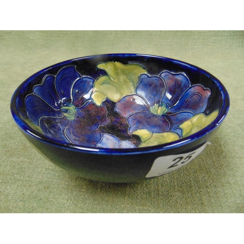 25 - Moorcroft Hibiscus pattern footed bowl, having original paper label.  6.5