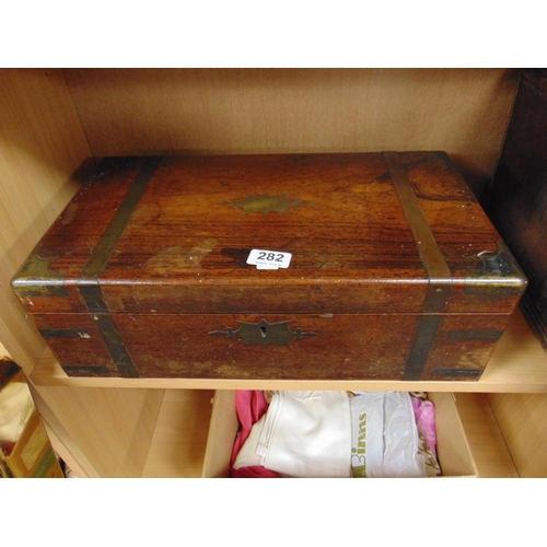 282 - 19th century brass bound rosewood writing box, having lift up lid and fitted interior. 6 x 17.5 x 9.... 