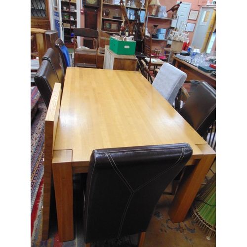 304 - Modern dining table, and five leather type chairs, The table 91