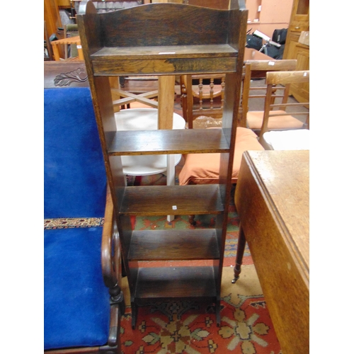 307 - A narrow oak three tier bookcase, 47 x 15 x 7