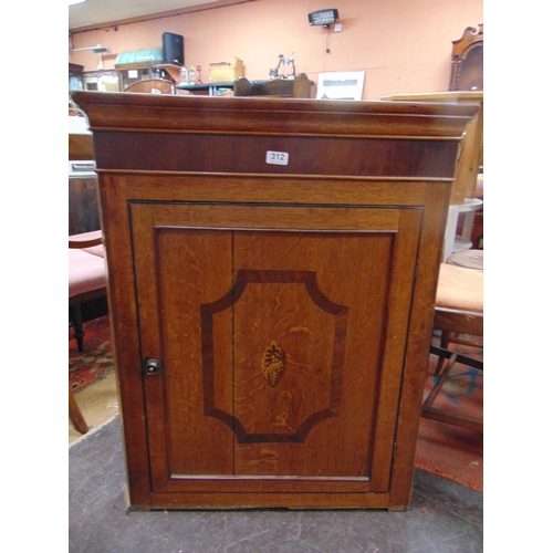 312 - Antique oak corner cupboard, ogive cornice , inlaid shell crossbanded door, revealing a shelf lined ... 