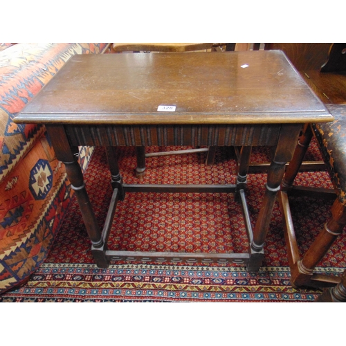 328 - An oak centre table, rectangular top, baluster turned supports, joined by plain stretchers. 28 x 27 ... 