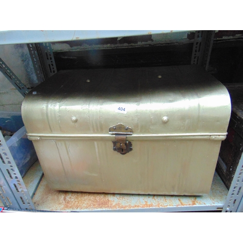 404 - Gilt painted travel trunk, having lift up lid and side handles.