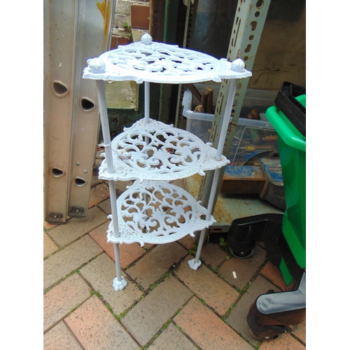 407 - Painted cast metal three tier pan stand. 24