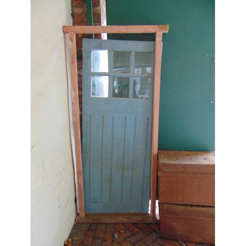 436 - An external door and frame, having glazed upper portion. the door 79 x 32