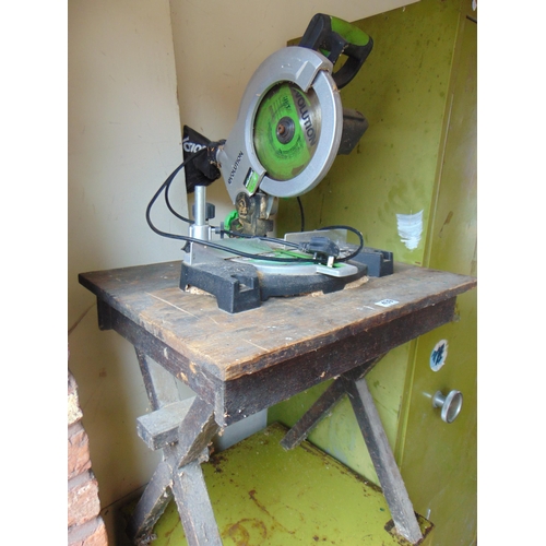 439 - Evolution chop saw on stand.