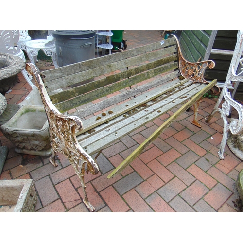 442 - Cast metal garden bench, having wooden slatted back and seat. 51