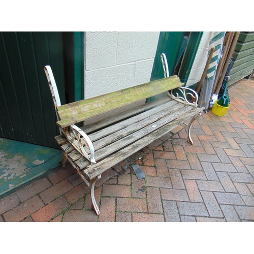 455 - Wooden slatted garden bench , having shaped metal ends, for restoration. 48