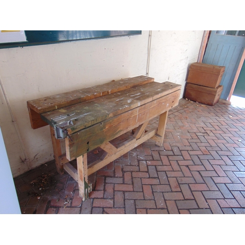 459 - Large wooden work bench, having vice to either side.  35 x 68 x 25